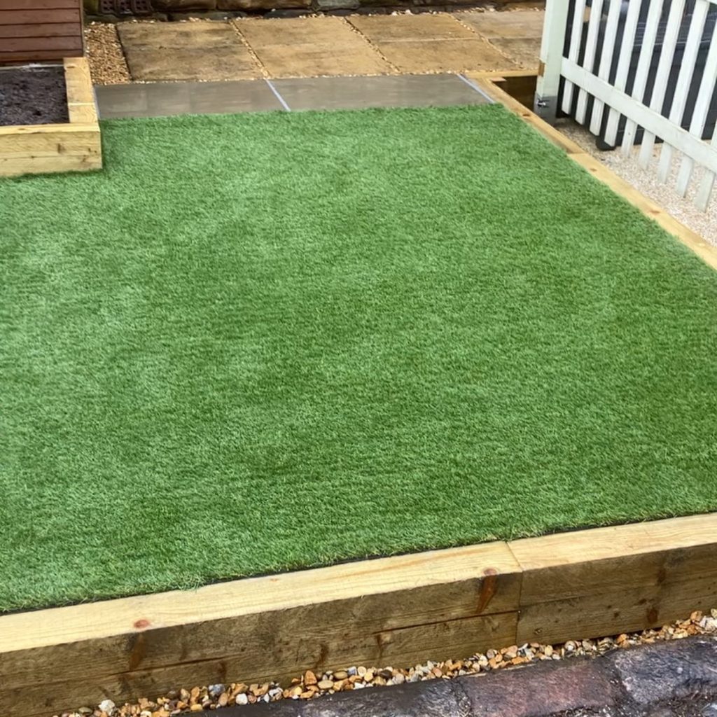 Indian Stone Patio and Artificial Lawn in Glossop