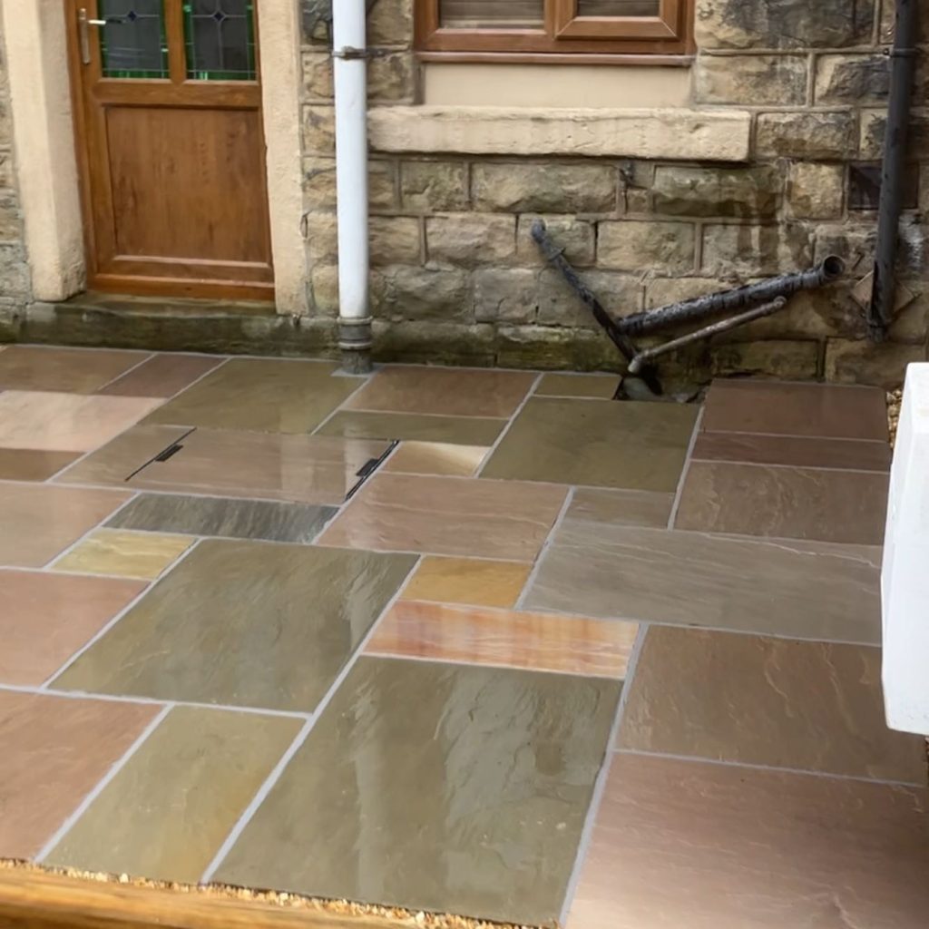 Indian Stone Patio and Artificial Lawn in Glossop