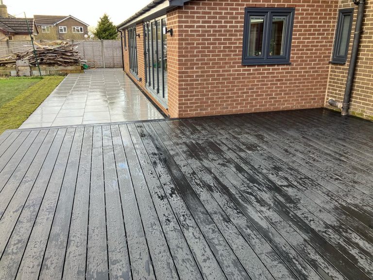 Large Composite Deck and Porcelain Patio