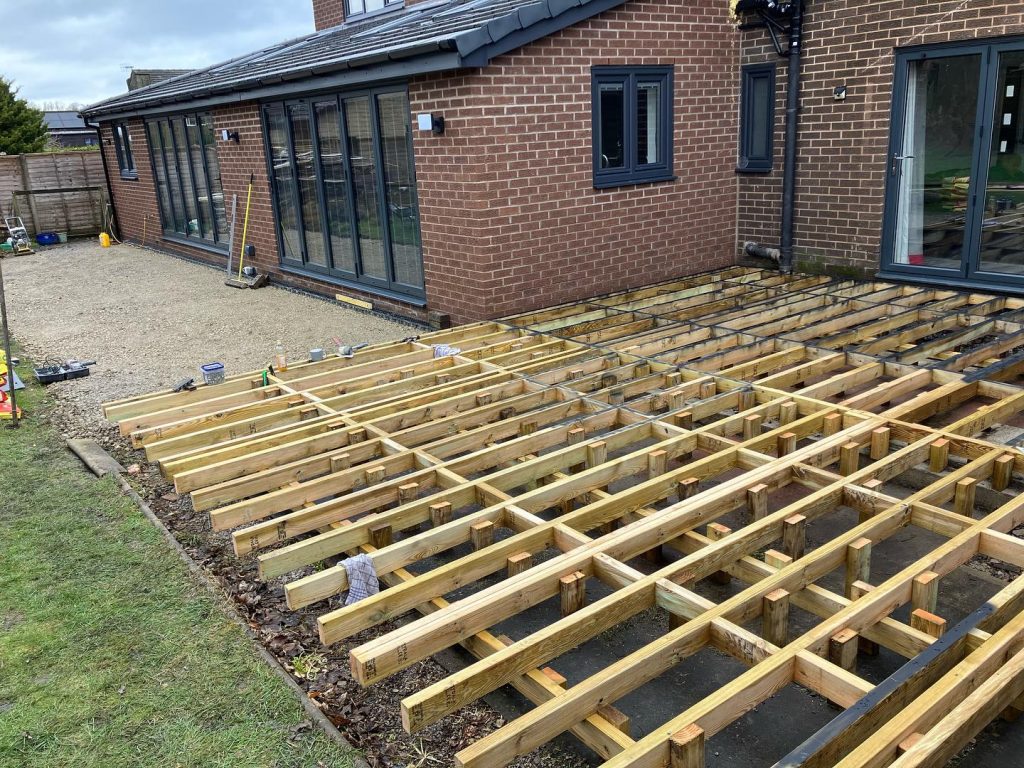 Large Composite Deck and Porcelain Patio