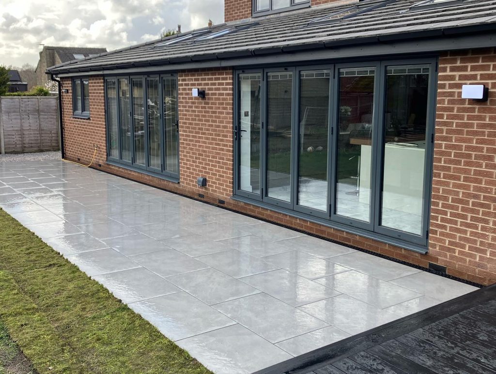 Large Composite Deck and Porcelain Patio