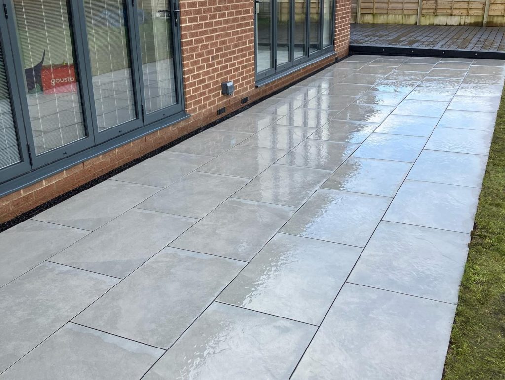 Large Composite Deck and Porcelain Patio