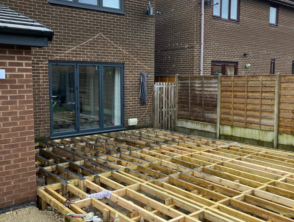 Large Composite Deck and Porcelain Patio