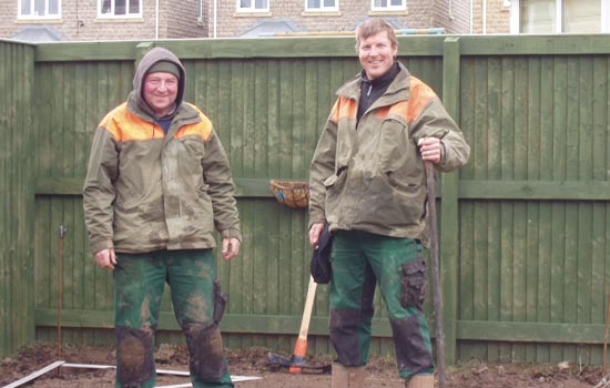 Two members of the Arundel Landscapes team working on site